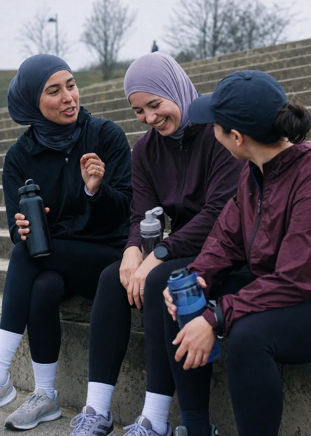 Three women talking together after a run